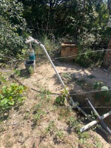 Acceso al agua potable en la comunidad indígena de San Juancito, Bolivia, gracias a un proyecto de cooperación internacional.